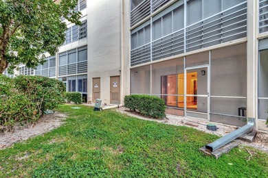 Bright first floor condo in Wynmoor, a gated 55 plus community on Wynmoor Golf Course in Florida - for sale on GolfHomes.com, golf home, golf lot