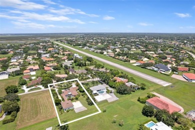 Experience the ultimate blend of luxury & aviation lifestyle in on The Wanderers Club in Florida - for sale on GolfHomes.com, golf home, golf lot