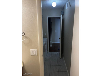 SPACIOUS TOWNHOUSE WITH 2 CAR GARAGE !  UNIQUE COMMUNITY THAT on Las Vegas National Golf Club in Nevada - for sale on GolfHomes.com, golf home, golf lot