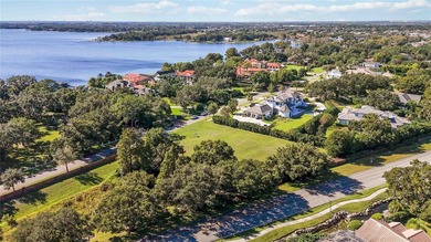 Welcome to Chaine Du Lac- one of Windermere's most exclusive on Windermere Country Club in Florida - for sale on GolfHomes.com, golf home, golf lot