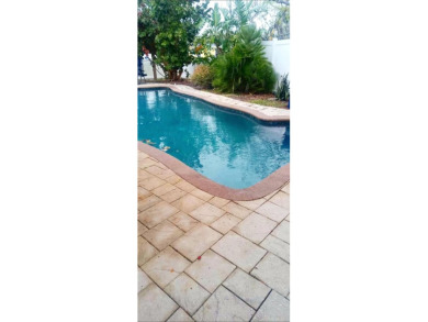 Gorgeous Dunedin pool home for sale. This house is located in on The Dunedin Country Club in Florida - for sale on GolfHomes.com, golf home, golf lot