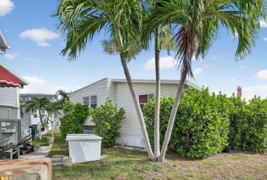 Welcome to island living at its finest! This beautifully updated on Island Dunes Country Club in Florida - for sale on GolfHomes.com, golf home, golf lot