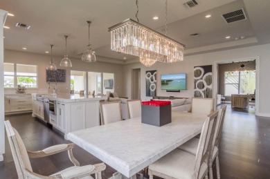 Luxuriously appointed, this coveted extended Santangelo model on Jupiter Country Club in Florida - for sale on GolfHomes.com, golf home, golf lot