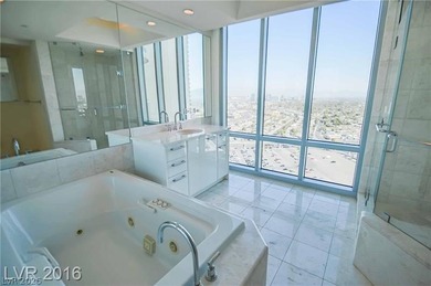 BEST PRICED HIGH FLOOR RESIDENCE w/ PHENOMENAL VIEWS OF THE on Las Vegas Country Club in Nevada - for sale on GolfHomes.com, golf home, golf lot