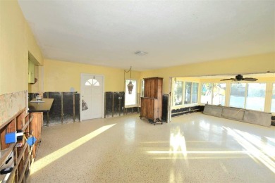 Gorgeous Dunedin pool home for sale. This house is located in on The Dunedin Country Club in Florida - for sale on GolfHomes.com, golf home, golf lot