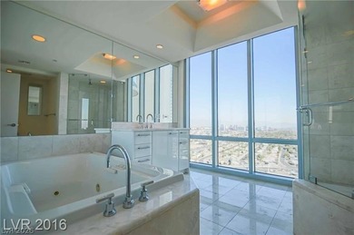 BEST PRICED HIGH FLOOR RESIDENCE w/ PHENOMENAL VIEWS OF THE on Las Vegas Country Club in Nevada - for sale on GolfHomes.com, golf home, golf lot