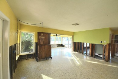 Gorgeous Dunedin pool home for sale. This house is located in on The Dunedin Country Club in Florida - for sale on GolfHomes.com, golf home, golf lot
