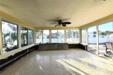 Gorgeous Dunedin pool home for sale. This house is located in on The Dunedin Country Club in Florida - for sale on GolfHomes.com, golf home, golf lot
