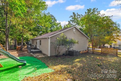 Lake Life is calling. This beautifully updated 3 bed, 2 bath on Tega Cay Golf Club in South Carolina - for sale on GolfHomes.com, golf home, golf lot