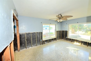 Gorgeous Dunedin pool home for sale. This house is located in on The Dunedin Country Club in Florida - for sale on GolfHomes.com, golf home, golf lot