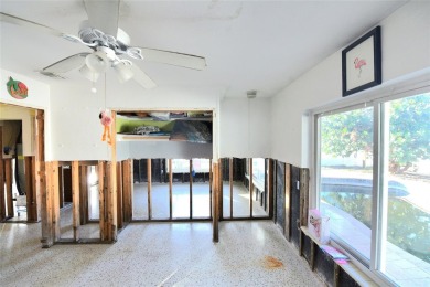 Gorgeous Dunedin pool home for sale. This house is located in on The Dunedin Country Club in Florida - for sale on GolfHomes.com, golf home, golf lot