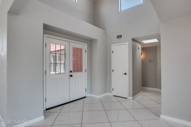 Discover this spacious, beautifully updated modern home on Omni Tucson National Golf Resort and Spa - Sonoran in Arizona - for sale on GolfHomes.com, golf home, golf lot
