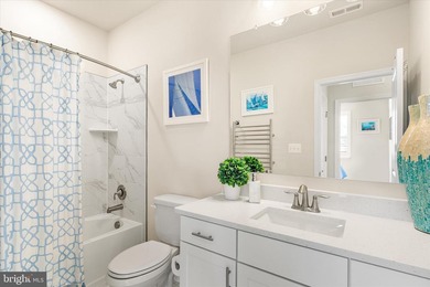 Welcome to 24321 Blue Crab Ave, a three-year-young town home on The Peninsula Golf and Country Club in Delaware - for sale on GolfHomes.com, golf home, golf lot