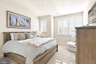 Welcome to 24321 Blue Crab Ave, a three-year-young town home on The Peninsula Golf and Country Club in Delaware - for sale on GolfHomes.com, golf home, golf lot