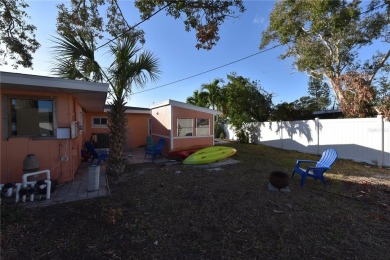 Gorgeous Dunedin pool home for sale. This house is located in on The Dunedin Country Club in Florida - for sale on GolfHomes.com, golf home, golf lot