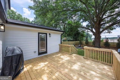 Step into this absolutely stunning, fully renovated home in the on East Lake Golf Club in Georgia - for sale on GolfHomes.com, golf home, golf lot