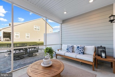 Welcome to 24321 Blue Crab Ave, a three-year-young town home on The Peninsula Golf and Country Club in Delaware - for sale on GolfHomes.com, golf home, golf lot