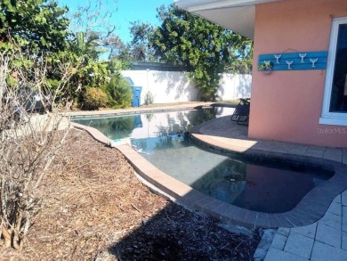 Gorgeous Dunedin pool home for sale. This house is located in on The Dunedin Country Club in Florida - for sale on GolfHomes.com, golf home, golf lot