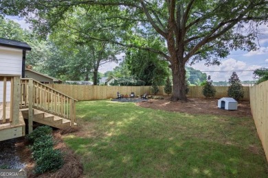 Step into this absolutely stunning, fully renovated home in the on East Lake Golf Club in Georgia - for sale on GolfHomes.com, golf home, golf lot