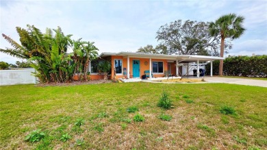 Gorgeous Dunedin pool home for sale. This house is located in on The Dunedin Country Club in Florida - for sale on GolfHomes.com, golf home, golf lot