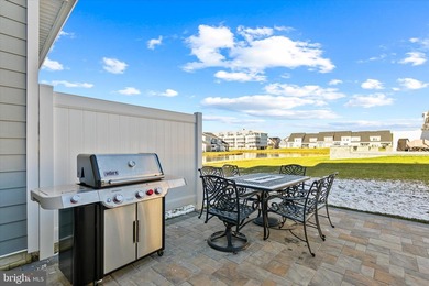 Welcome to 24321 Blue Crab Ave, a three-year-young town home on The Peninsula Golf and Country Club in Delaware - for sale on GolfHomes.com, golf home, golf lot