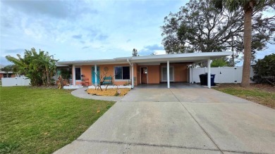 Gorgeous Dunedin pool home for sale. This house is located in on The Dunedin Country Club in Florida - for sale on GolfHomes.com, golf home, golf lot