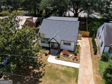 Step into this absolutely stunning, fully renovated home in the on East Lake Golf Club in Georgia - for sale on GolfHomes.com, golf home, golf lot