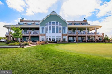 Welcome to 24321 Blue Crab Ave, a three-year-young town home on The Peninsula Golf and Country Club in Delaware - for sale on GolfHomes.com, golf home, golf lot