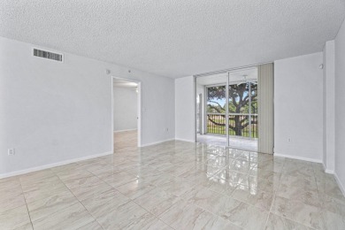You are going to fall in love with this stunning 2/2 condo in on Fountains Golf and Country Club in Florida - for sale on GolfHomes.com, golf home, golf lot