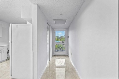 You are going to fall in love with this stunning 2/2 condo in on Fountains Golf and Country Club in Florida - for sale on GolfHomes.com, golf home, golf lot