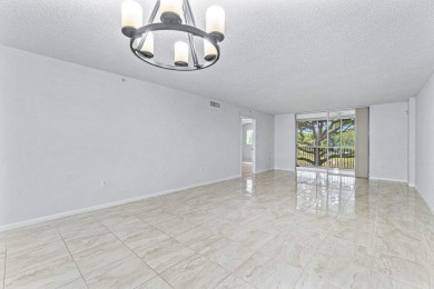 You are going to fall in love with this stunning 2/2 condo in on Fountains Golf and Country Club in Florida - for sale on GolfHomes.com, golf home, golf lot