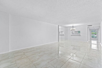 You are going to fall in love with this stunning 2/2 condo in on Fountains Golf and Country Club in Florida - for sale on GolfHomes.com, golf home, golf lot