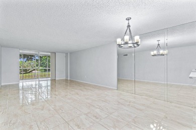 You are going to fall in love with this stunning 2/2 condo in on Fountains Golf and Country Club in Florida - for sale on GolfHomes.com, golf home, golf lot