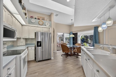 DEEP CREEK! Charming 3-bedroom, 2-bath home with a 2-car garage on Deep Creek Golf Club in Florida - for sale on GolfHomes.com, golf home, golf lot