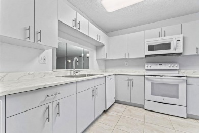 You are going to fall in love with this stunning 2/2 condo in on Fountains Golf and Country Club in Florida - for sale on GolfHomes.com, golf home, golf lot