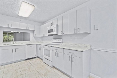 You are going to fall in love with this stunning 2/2 condo in on Fountains Golf and Country Club in Florida - for sale on GolfHomes.com, golf home, golf lot
