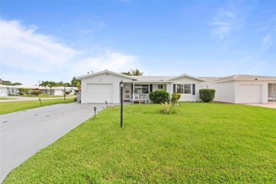Discover this charming 2/2 home situated on a lovely corner lot on Leisureville Community Association in Florida - for sale on GolfHomes.com, golf home, golf lot