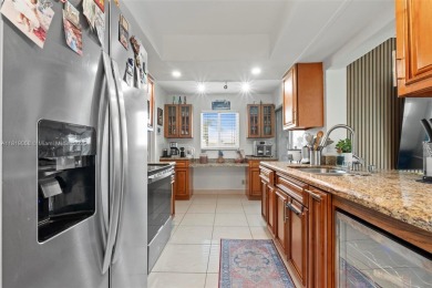Discover this charming 2/2 home situated on a lovely corner lot on Leisureville Community Association in Florida - for sale on GolfHomes.com, golf home, golf lot