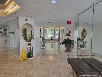 Live in elegance in this beautifully remodeled home in a gated on Inverrary Country Club in Florida - for sale on GolfHomes.com, golf home, golf lot