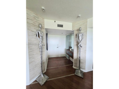 Live in elegance in this beautifully remodeled home in a gated on Inverrary Country Club in Florida - for sale on GolfHomes.com, golf home, golf lot