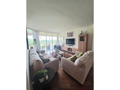 Live in elegance in this beautifully remodeled home in a gated on Inverrary Country Club in Florida - for sale on GolfHomes.com, golf home, golf lot