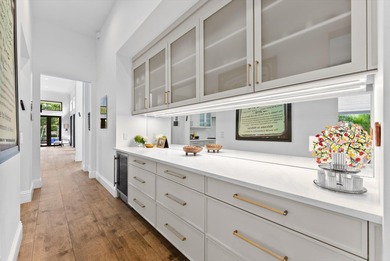 Located in Boca Grove, this two-story Mediterranean residence on Boca Grove Golf and Tennis in Florida - for sale on GolfHomes.com, golf home, golf lot