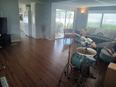 -- CHARMING 2 Bedroom / 1 Bath BEACH COTTAGE!! Located in the on Spessard Holland Golf Course in Florida - for sale on GolfHomes.com, golf home, golf lot