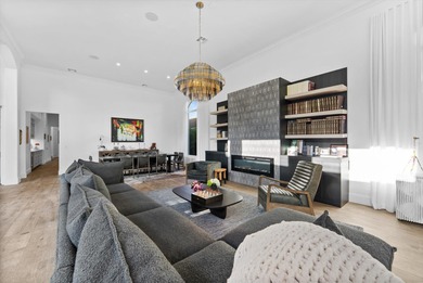 Located in Boca Grove, this two-story Mediterranean residence on Boca Grove Golf and Tennis in Florida - for sale on GolfHomes.com, golf home, golf lot