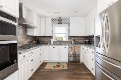 Just bring your suitcase - this turnkey home is tucked away in a on Wild Dunes Harbor Golf Resort in South Carolina - for sale on GolfHomes.com, golf home, golf lot