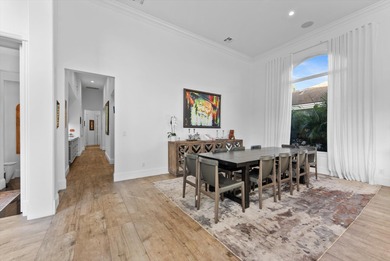 Located in Boca Grove, this two-story Mediterranean residence on Boca Grove Golf and Tennis in Florida - for sale on GolfHomes.com, golf home, golf lot