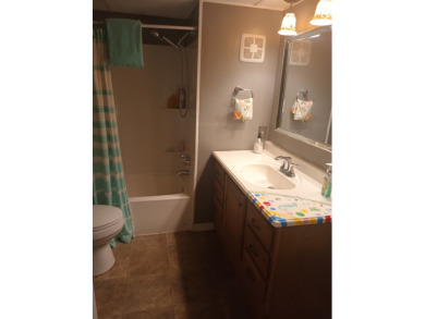 -- CHARMING 2 Bedroom / 1 Bath BEACH COTTAGE!! Located in the on Spessard Holland Golf Course in Florida - for sale on GolfHomes.com, golf home, golf lot