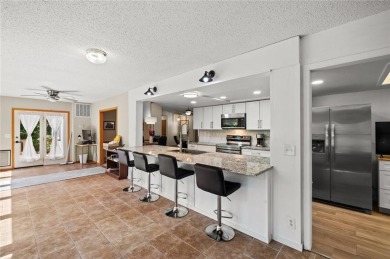 Fantastic family home that has been recently remodeled and is on Bella Vista - Metfield Golf Complex and Country Club in Arkansas - for sale on GolfHomes.com, golf home, golf lot