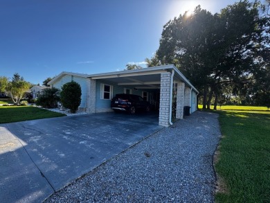 Welcome to this beautifully maintained and fully remodeled home on Hamptons Golf Club in Florida - for sale on GolfHomes.com, golf home, golf lot