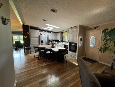 Welcome to this beautifully maintained and fully remodeled home on Hamptons Golf Club in Florida - for sale on GolfHomes.com, golf home, golf lot